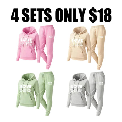 Two-piece set consisting of a letter-print sweatshirt and sweatpants.